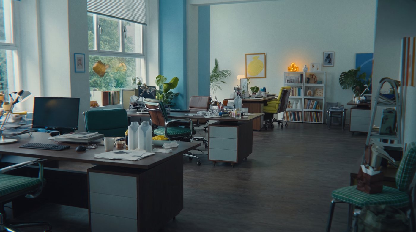 Second shot of the office in a cool teal grade